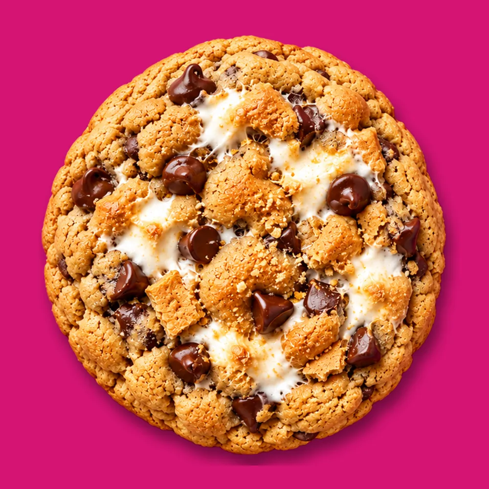S'mores cookie with melted marshmallow, chocolate chips and graham cracker pieces